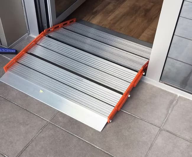 MIOR ROLL modulaire aluminium oprijplaat in gebruik — geen boren, geen montage